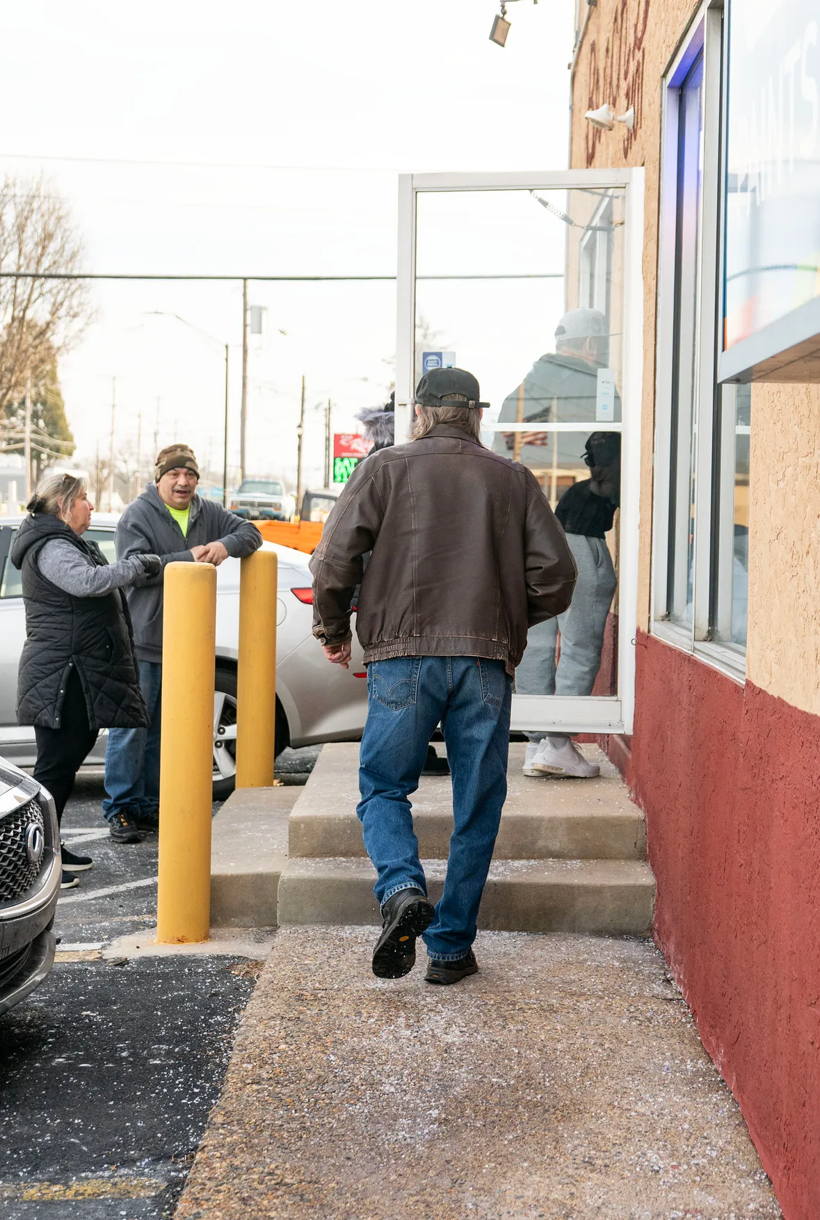 Customers walking into Beach's Hardware