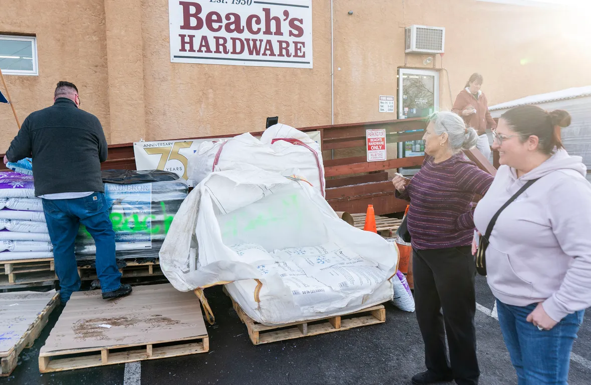 Outdoor community sale at Beach's Hardware storefront